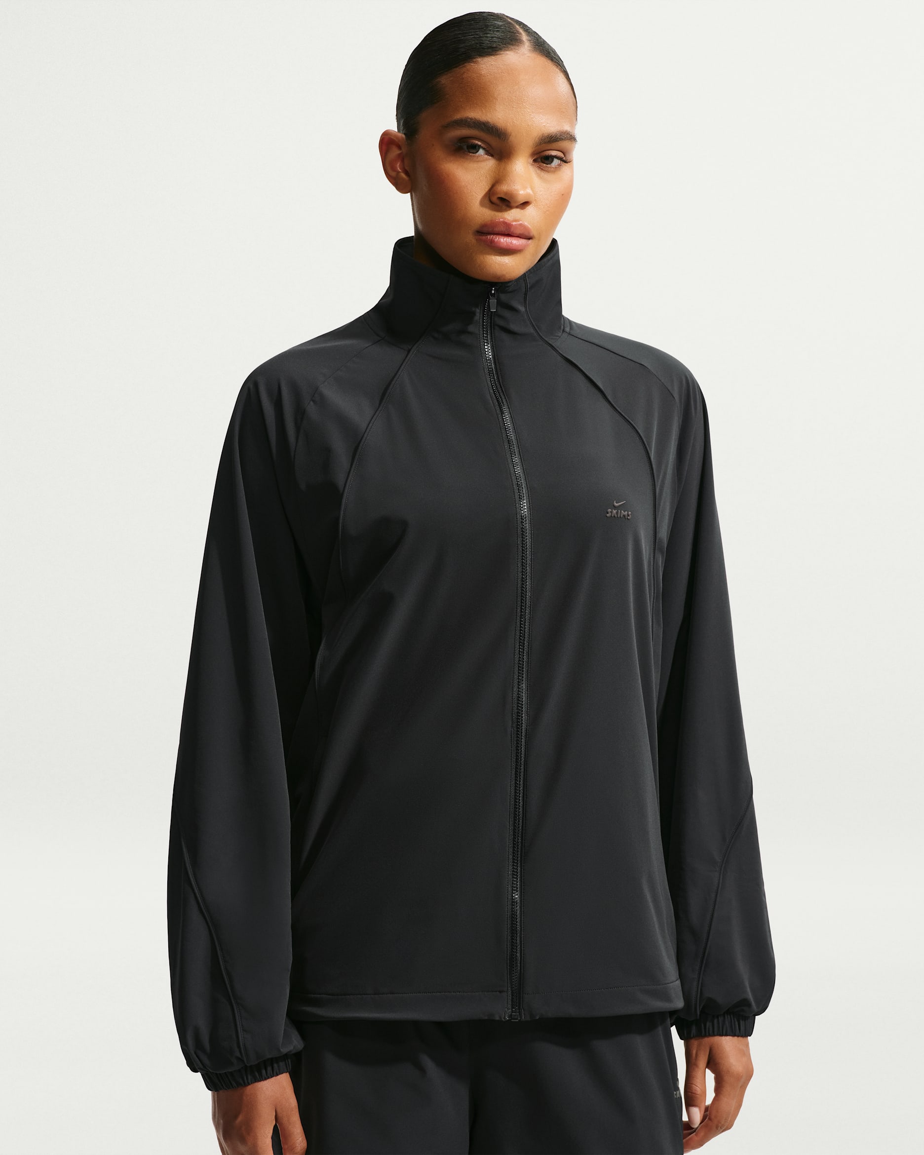 NikeSKIMS Stretch Nylon Women's Oversized Jacket. Nike SI